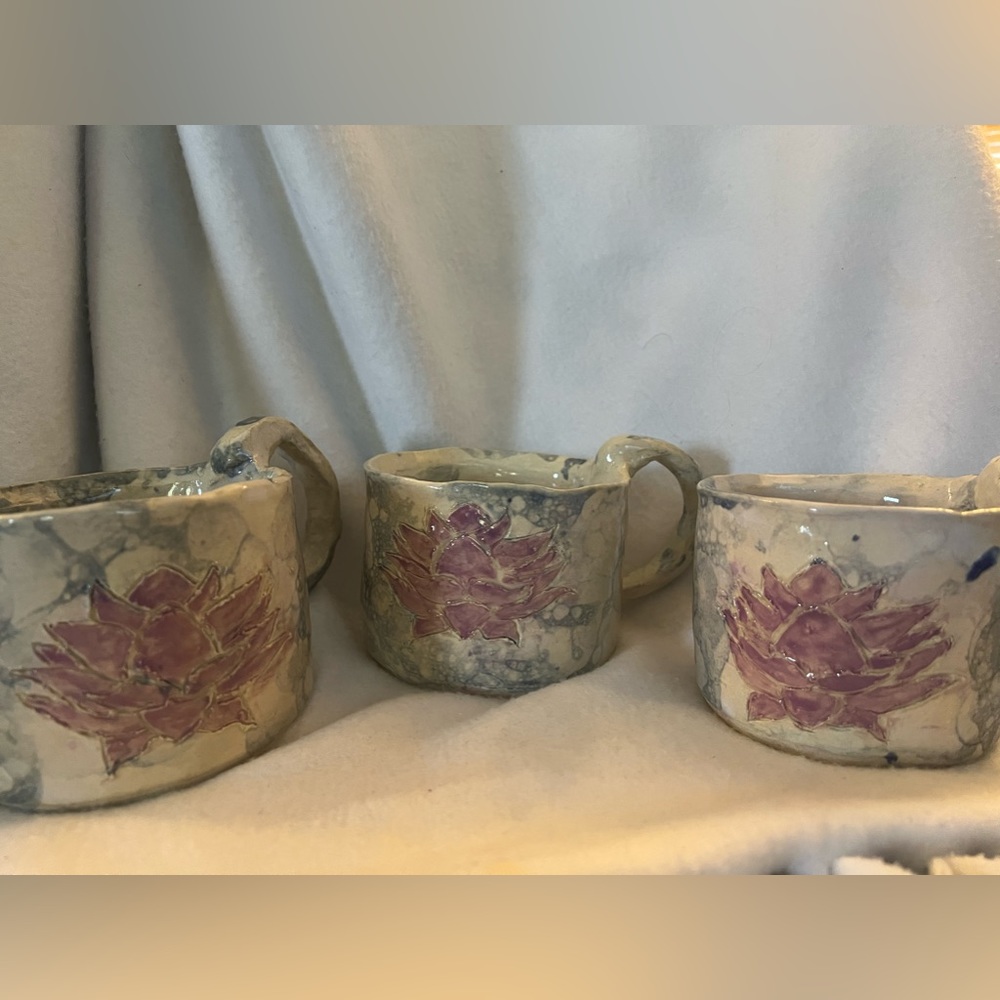 Three handmade ceramic bowls with Lotus